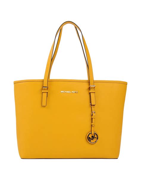 michael kors yellow sling bag|michael kors sling bag women.